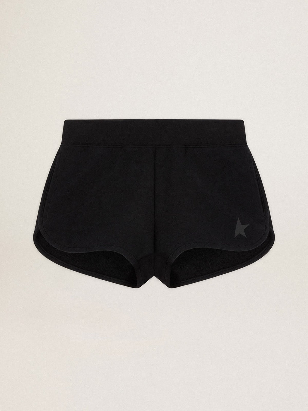 Pantaloncini di colore nero con stella ton sur ton sul davanti