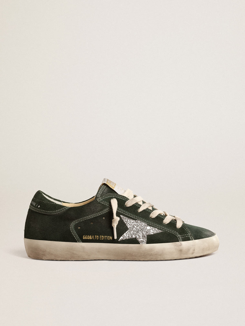 Super-Star LTD in suede verde con stella in glitter argento