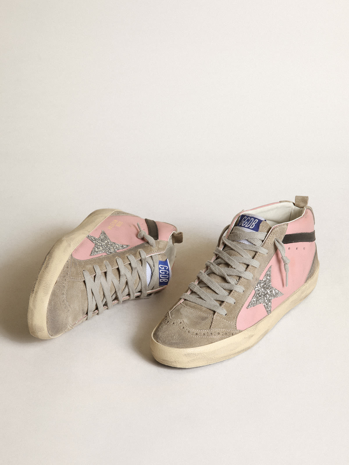 Sneaker Mid Star LTD in pelle rosa con stella in glitter argento e virgola in pelle nera