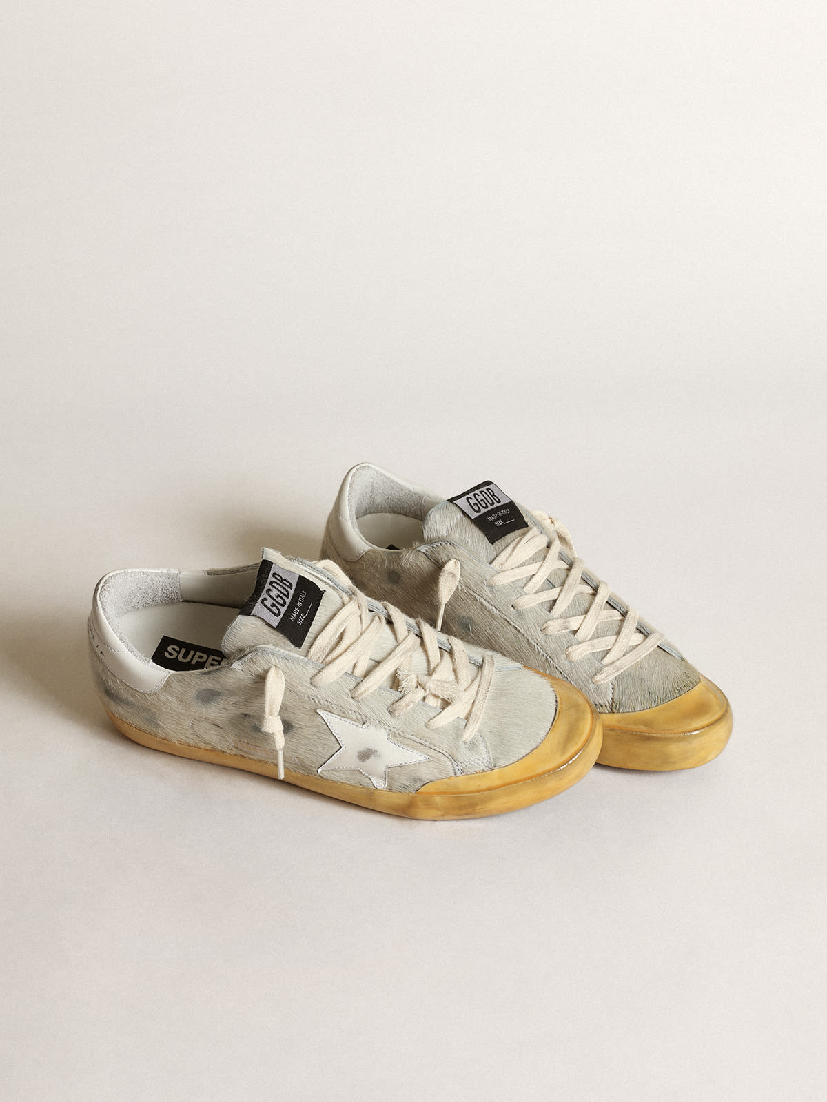 Sneaker Super-Star Penstar in cavallino bianco sporco con stella e talloncino in pelle bianca