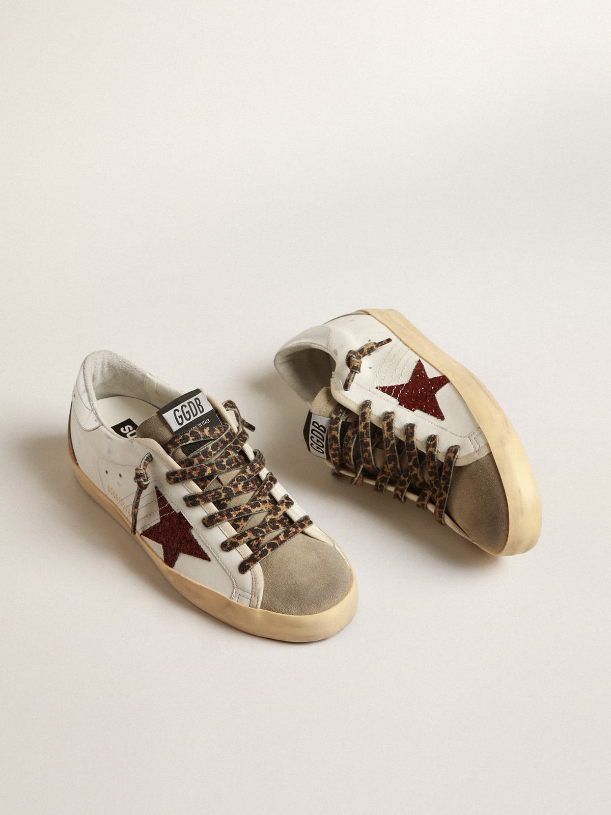 Super-Star con stella in glitter bordeaux e talloncino argento