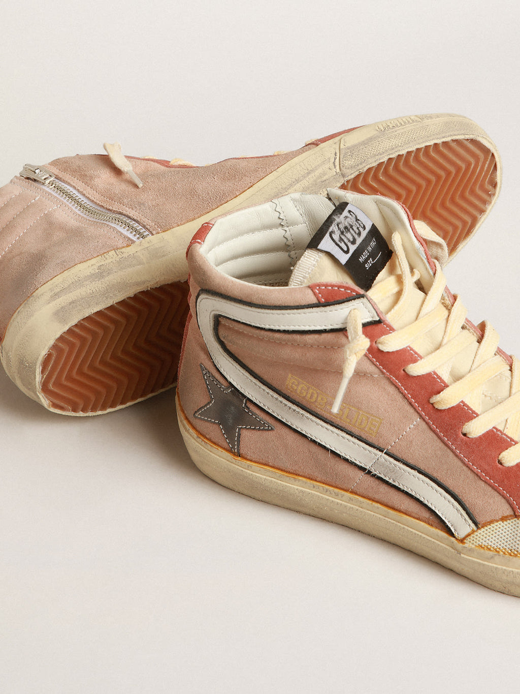 Slide in suede rosa con stella in pelle laminata color antracite