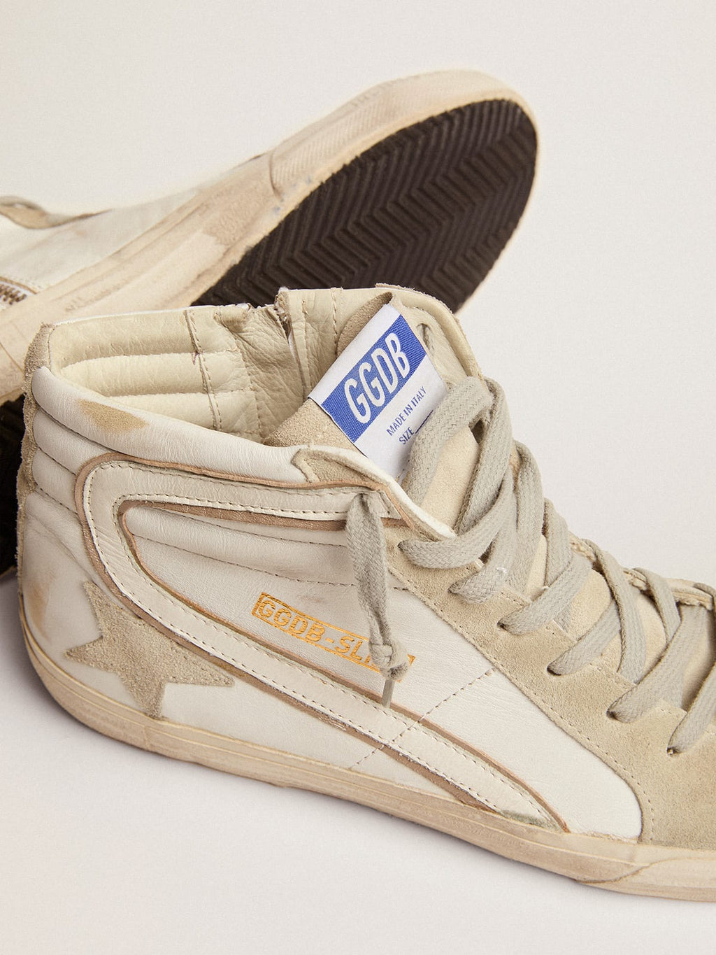 Sneakers Slide in pelle con stella e dettagli in camoscio