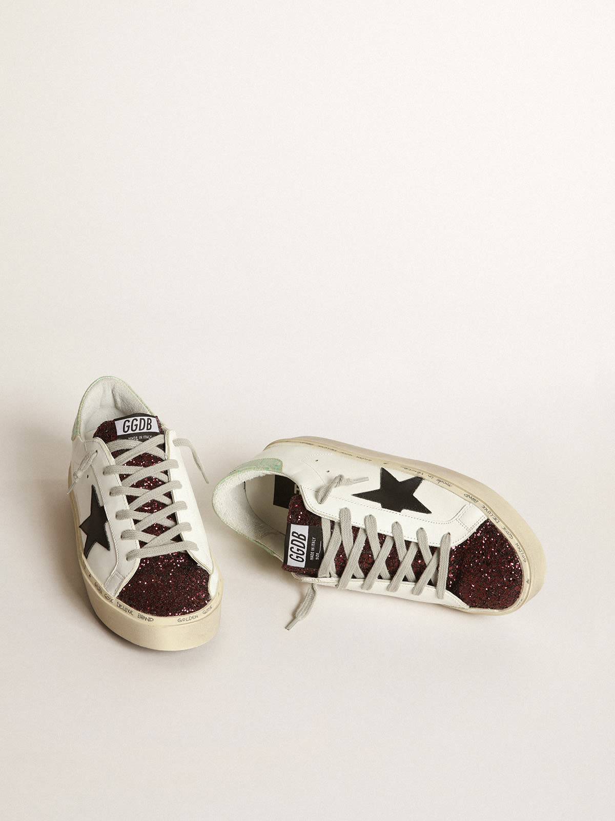 Sneakers Hi-Star bianche con inserto in glitter e stella nera