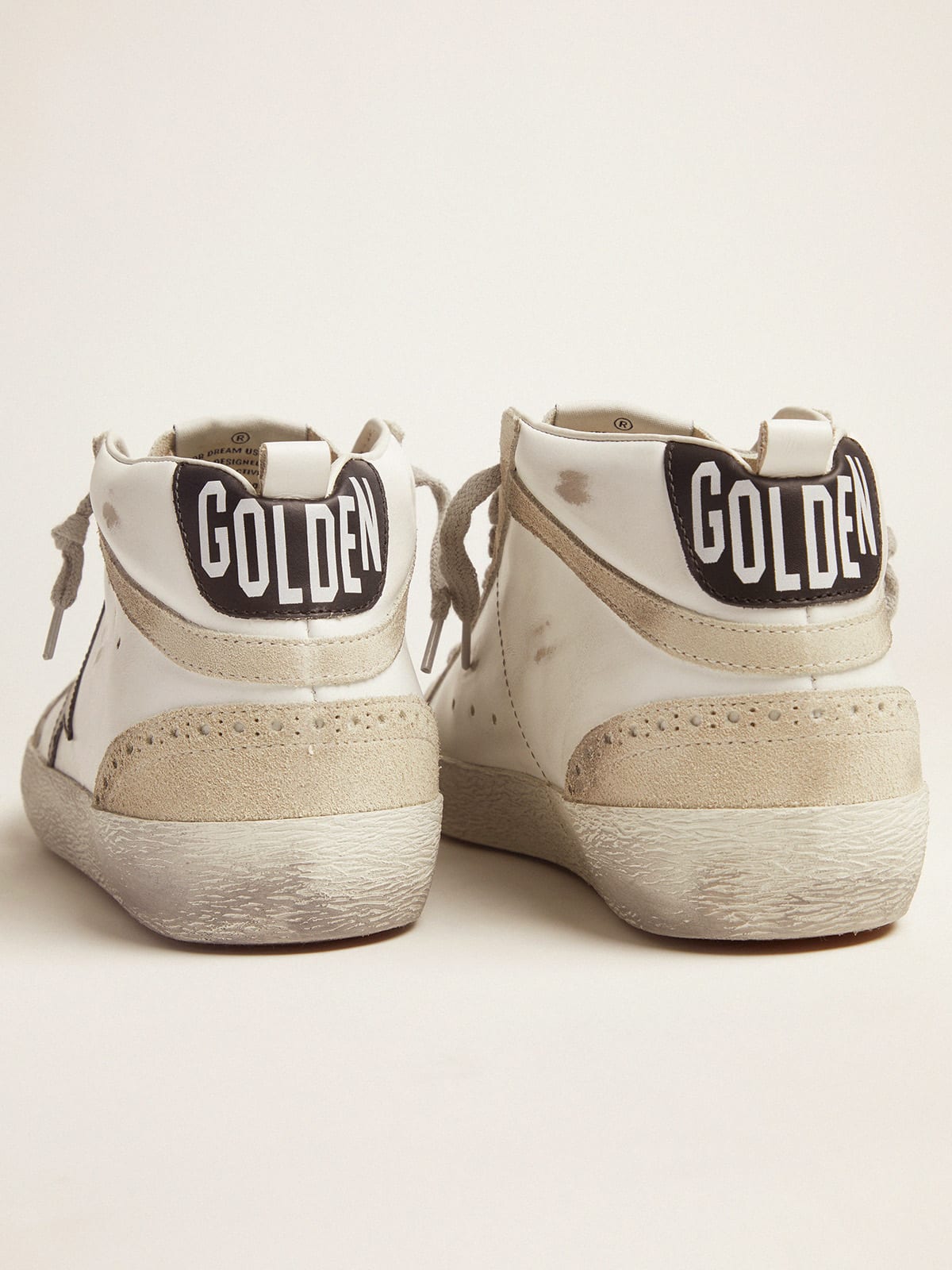 Sneakers Mid Star bianche e nere