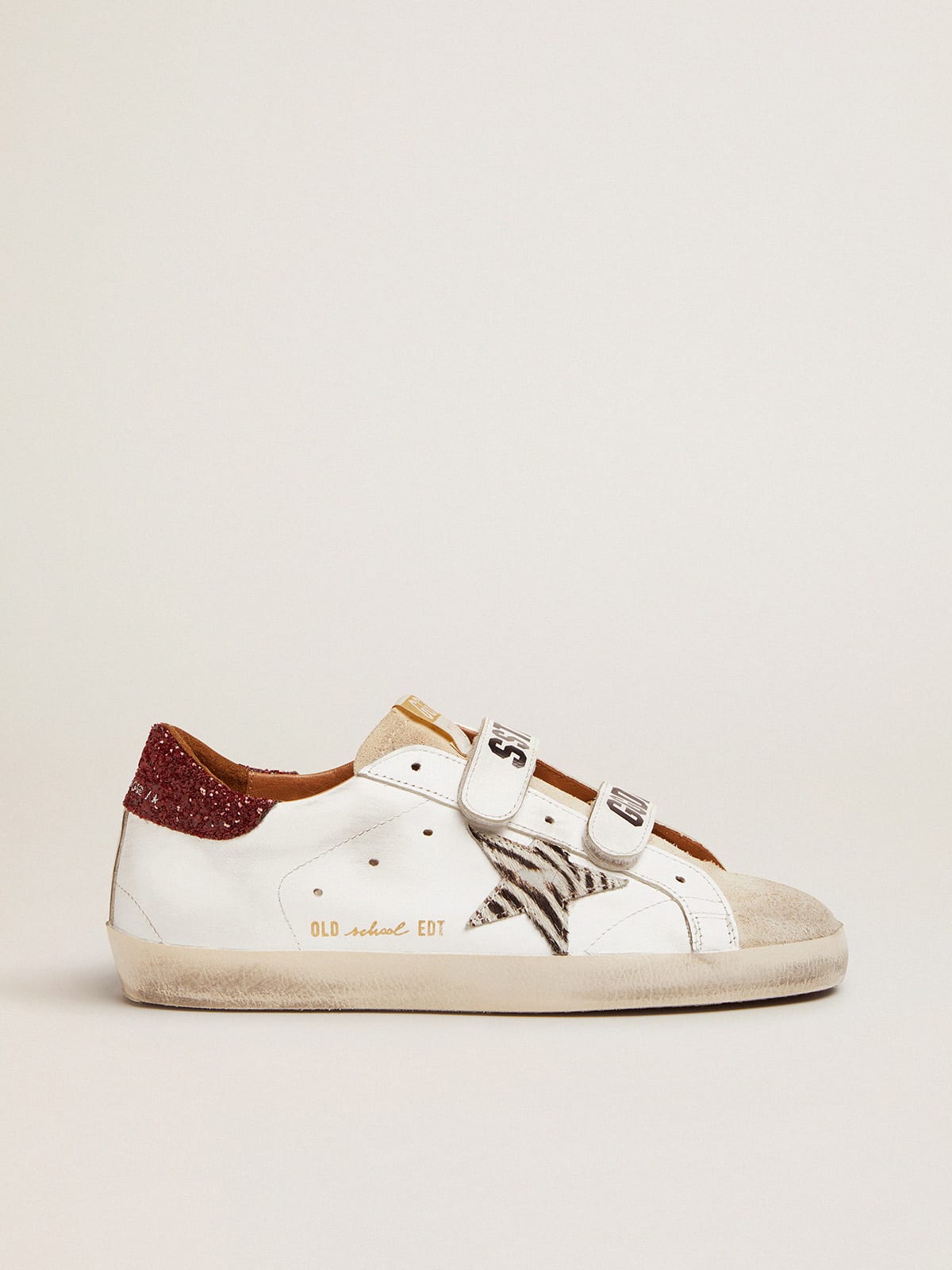 Sneaker Old School con stella in cavallino zebrato e talloncino in glitter rossi