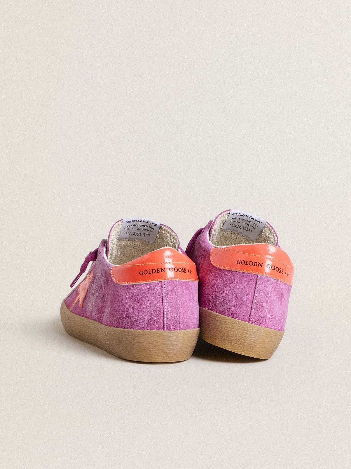 Women's Super-Star in fuchsia suede with fluorescent orange laminated leather star and heel tab