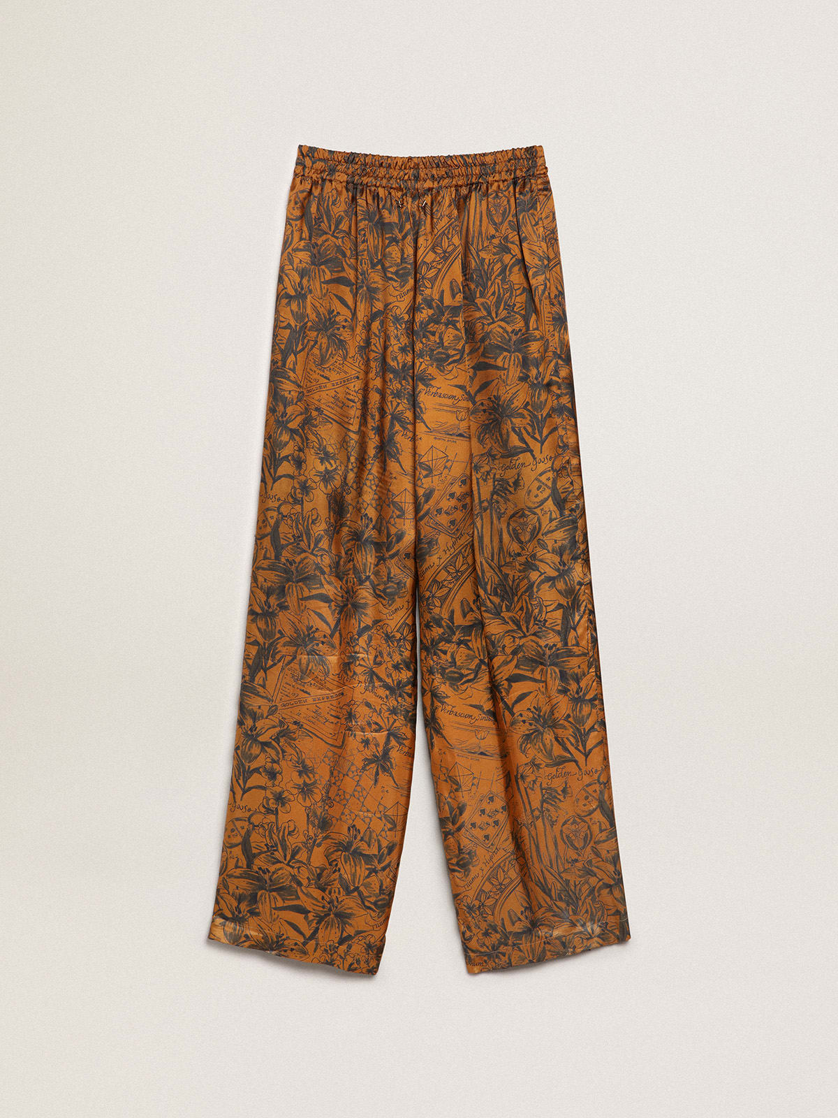Pantalone jogging Collezione Journey di colore marrone dorato con stampa notebook
