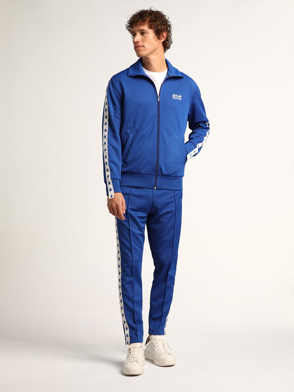 Felpa con zip da uomo di colore bluette con nastro bianco e stelle a contrasto