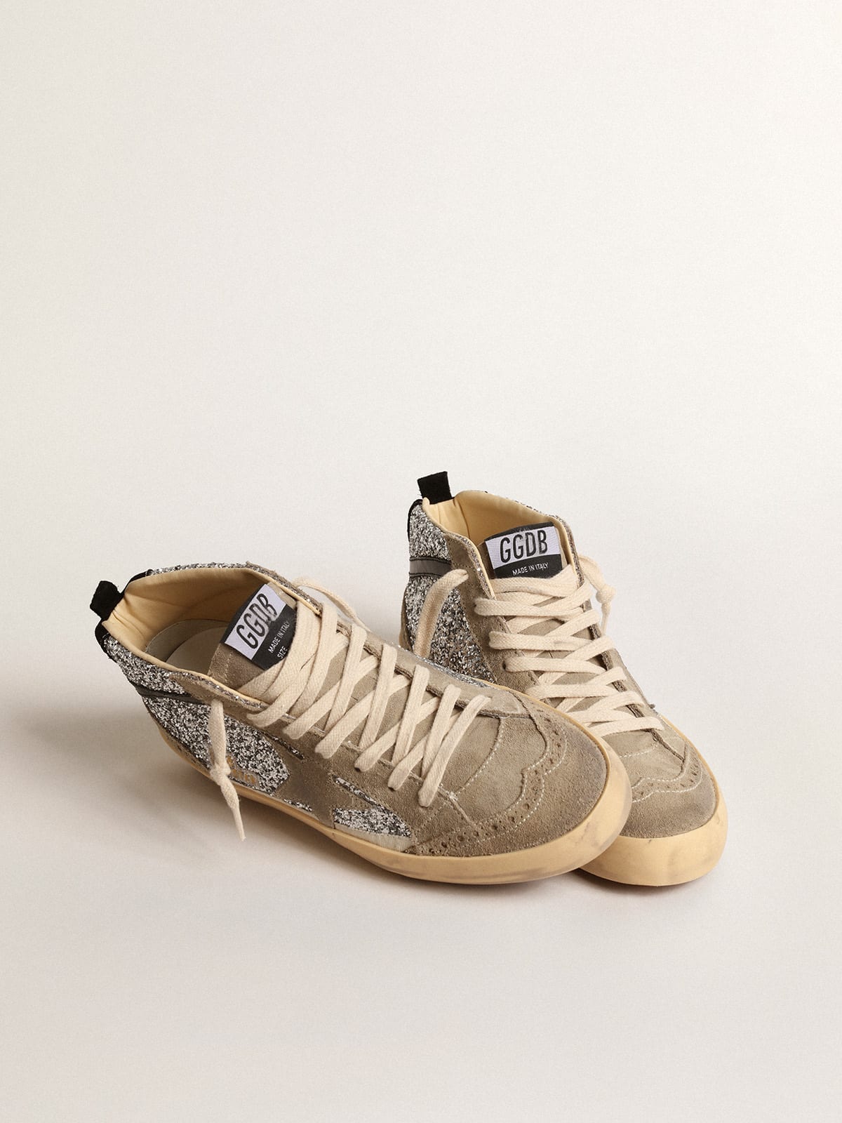 Mid Star in glitter argento con stella in suede e virgola nera