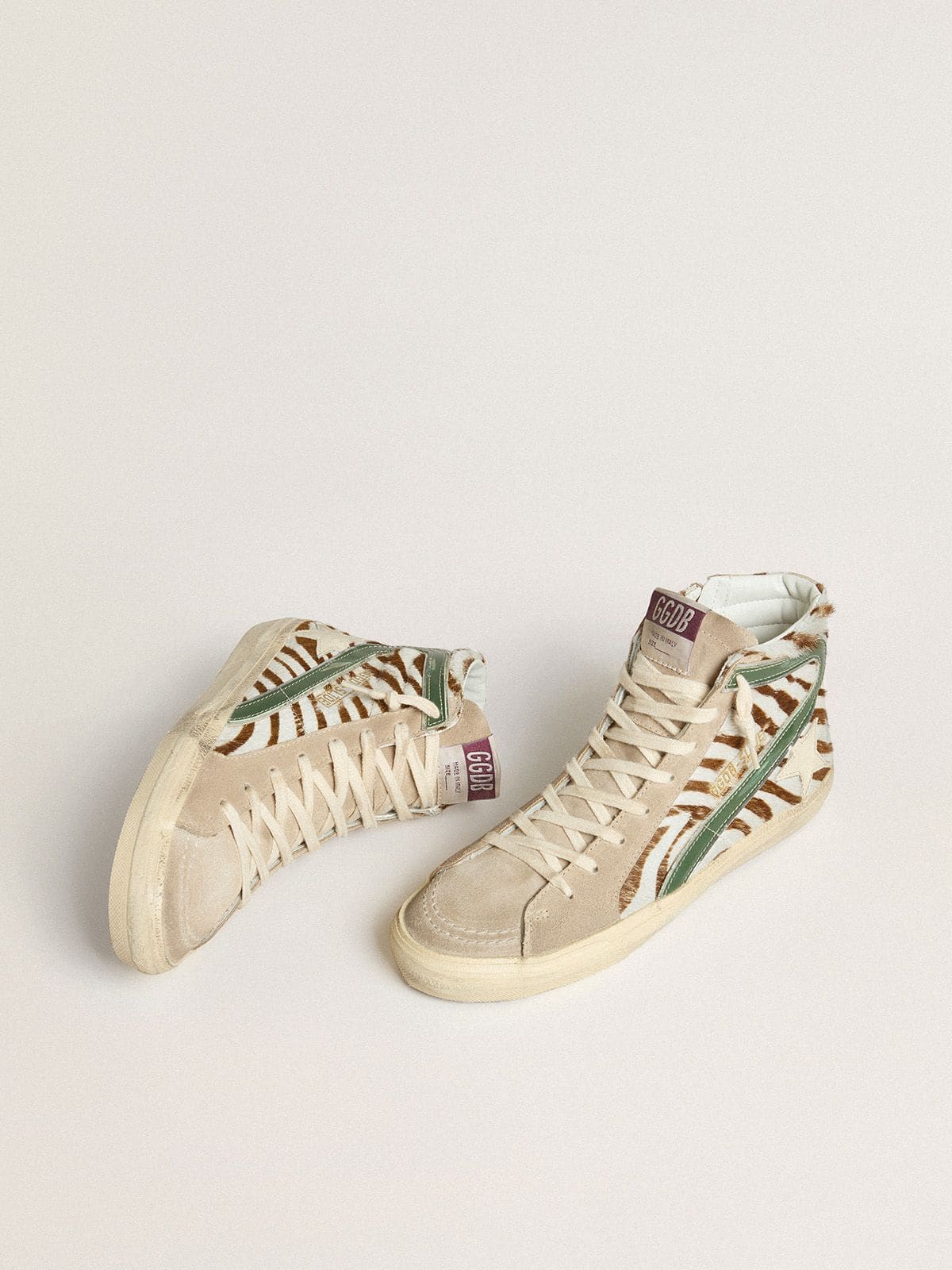 Women's Slide in zebra-print pony skin with green laminated leather flash