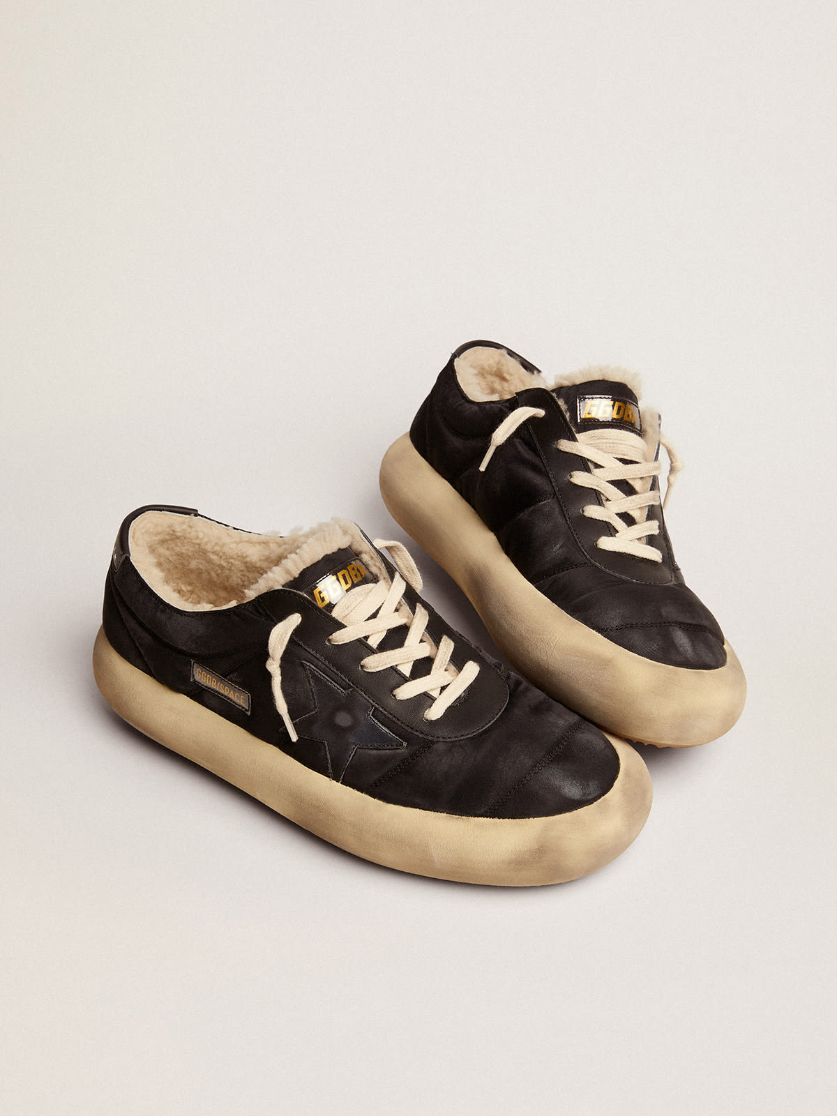 Space-Star Uomo in nylon nero trapuntato e fodera in shearling