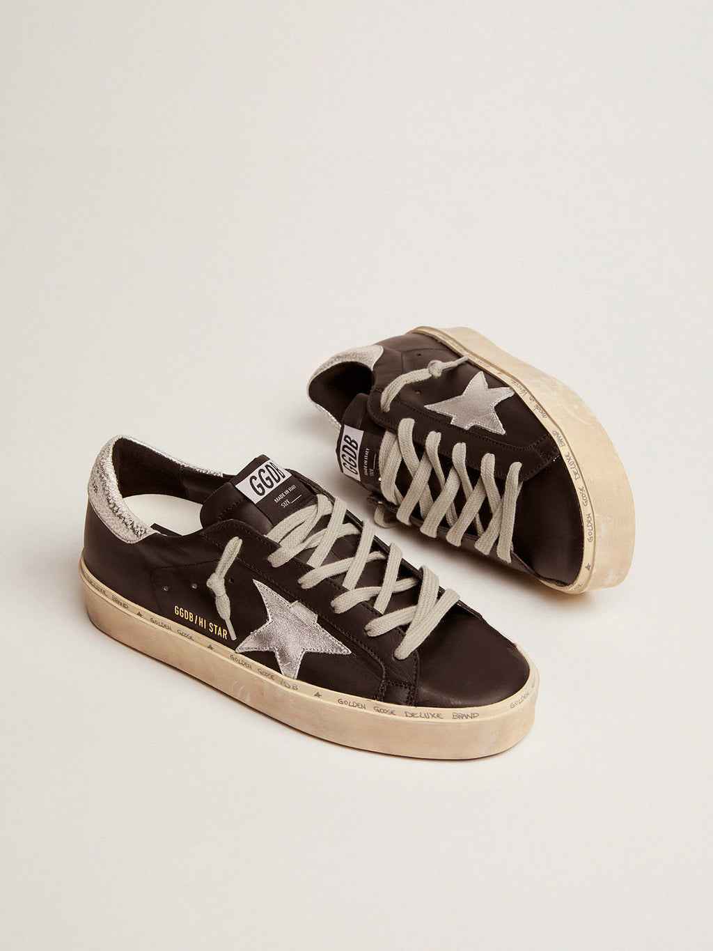 Sneaker Hi Star in pelle nera con stella in pelle laminata color argento