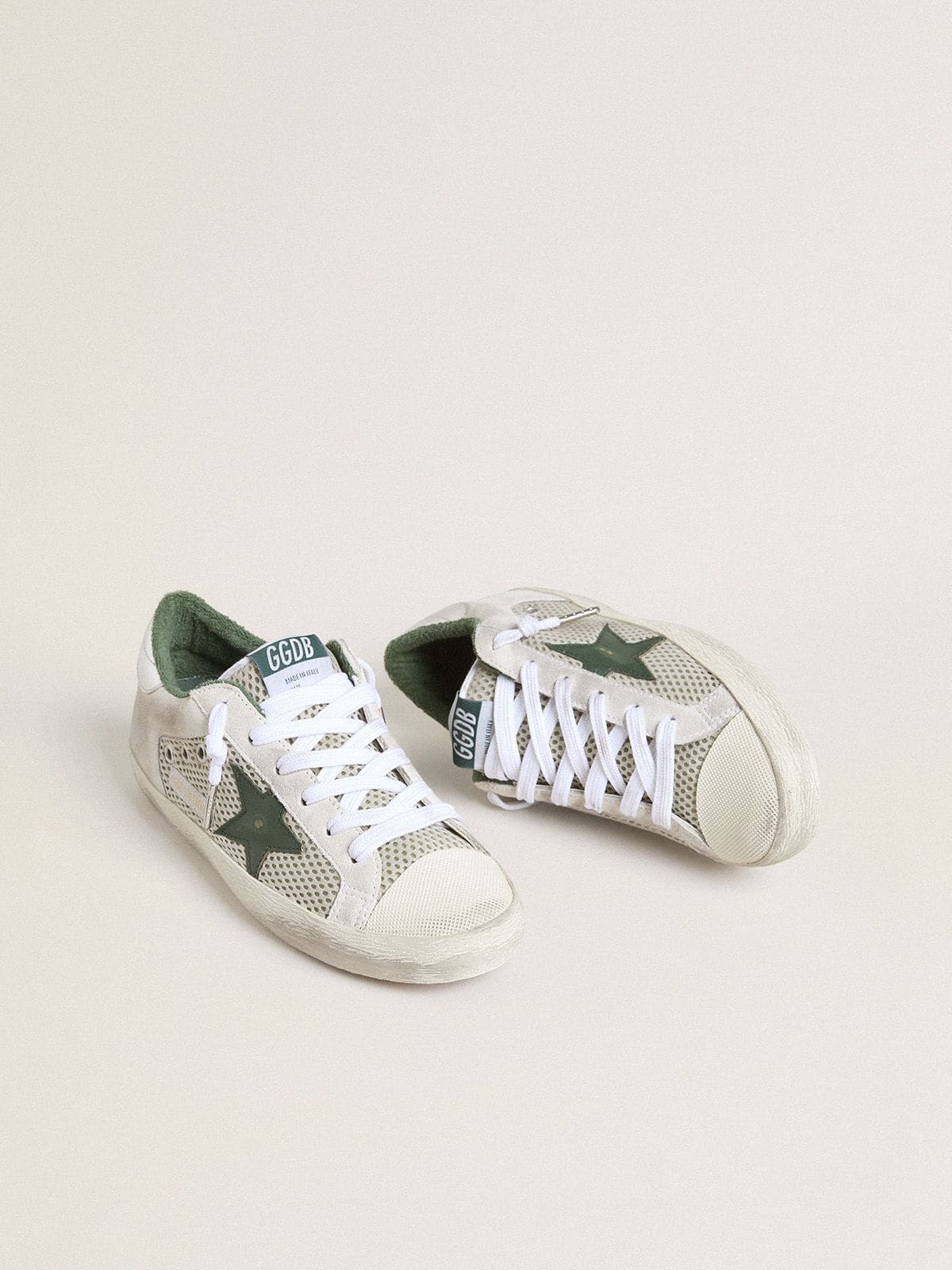 Women’s Super-Star LTD in white suede and mesh with green leather star and silver foiled leather heel tab