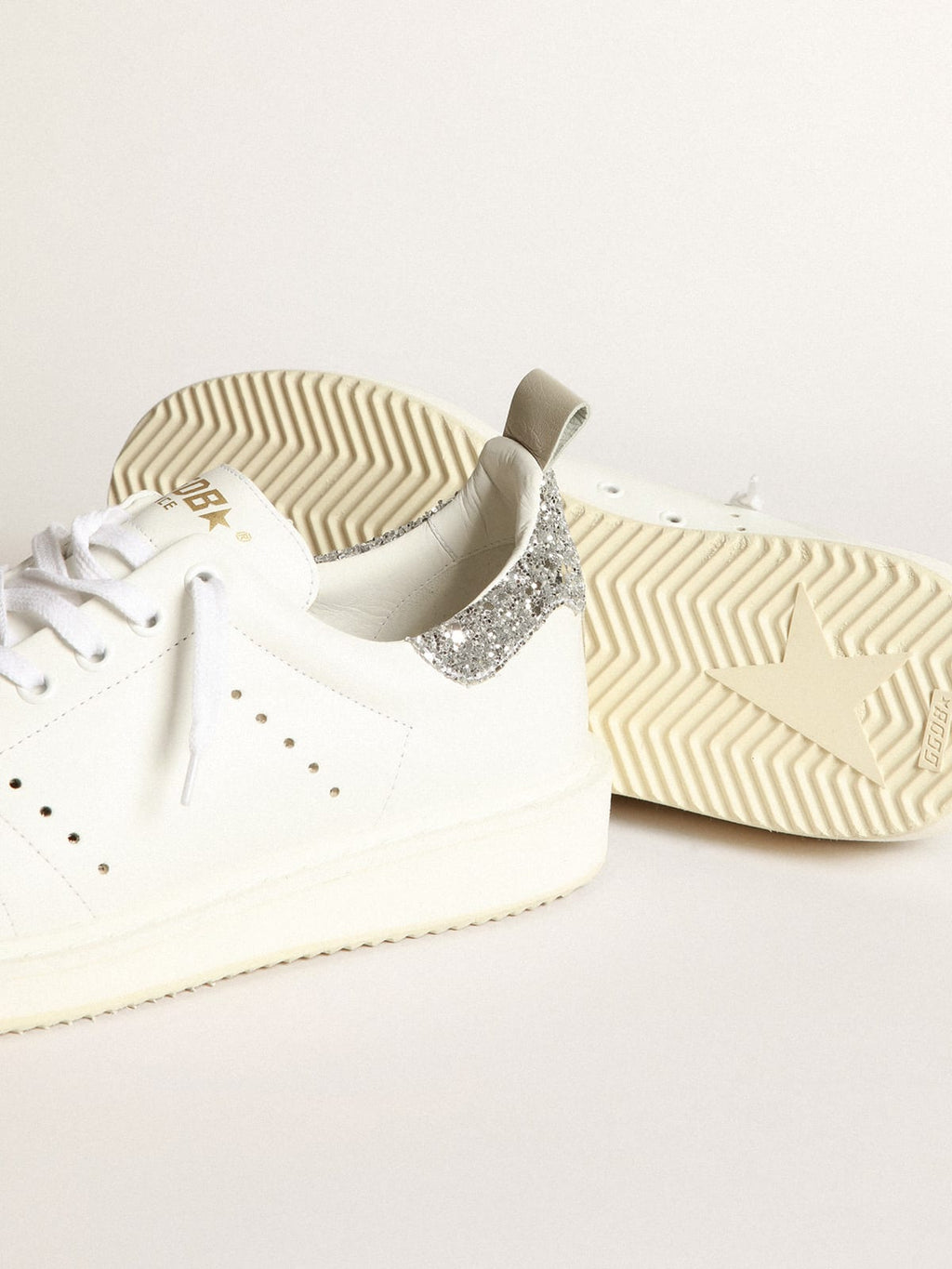 Sneaker Starter in pelle bianca con talloncino in glitter argento