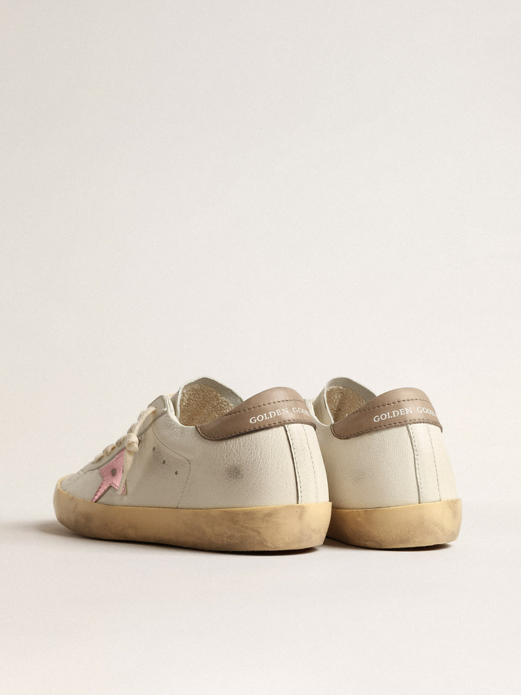 Super-Star in nappa bianca con stella in pelle laminata rosa
