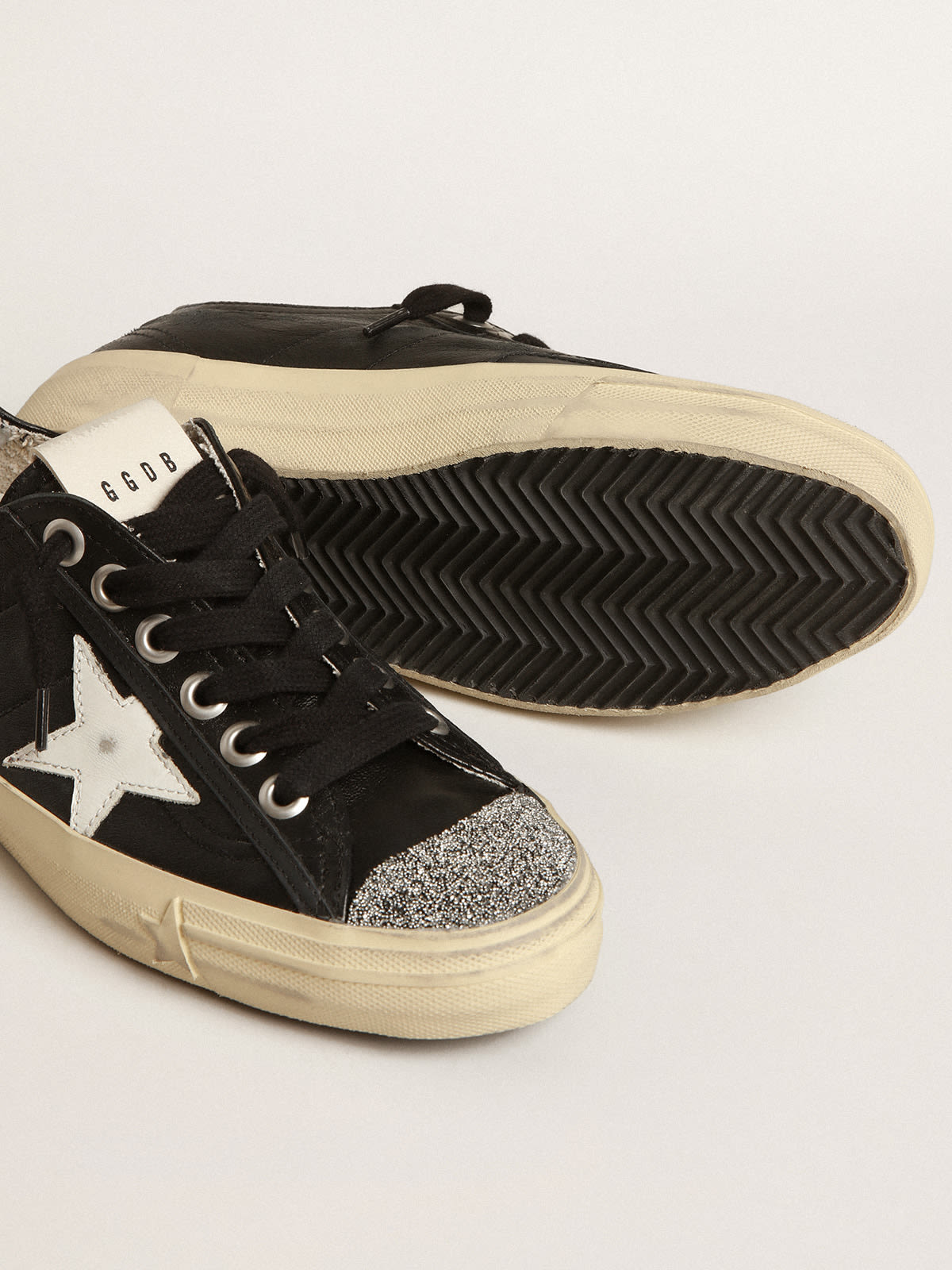 V-Star in nappa nera con stella bianca e punta in cristalli Swarovski