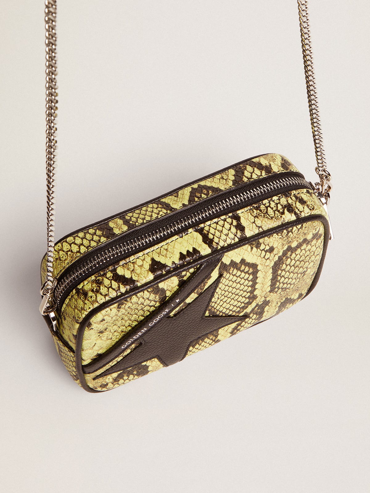 Borsa Mini Star Bag in pelle con stampa pitonata color lime e stella in pelle nera