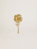 Gold pin with floral design