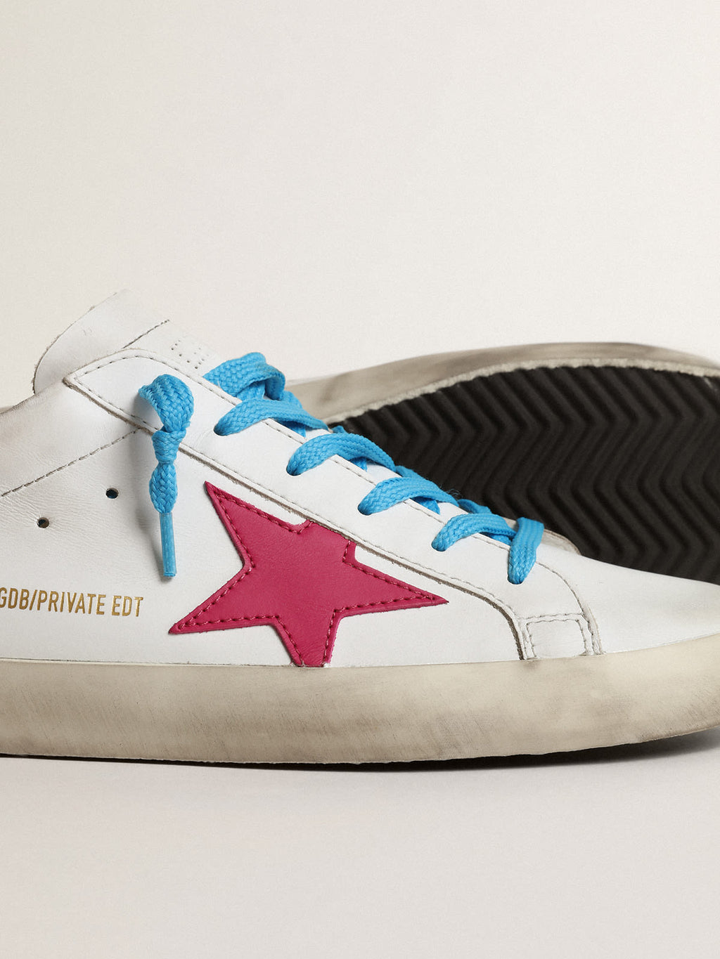 Super-Star LTD con stella in suede fucsia e talloncino camouflage
