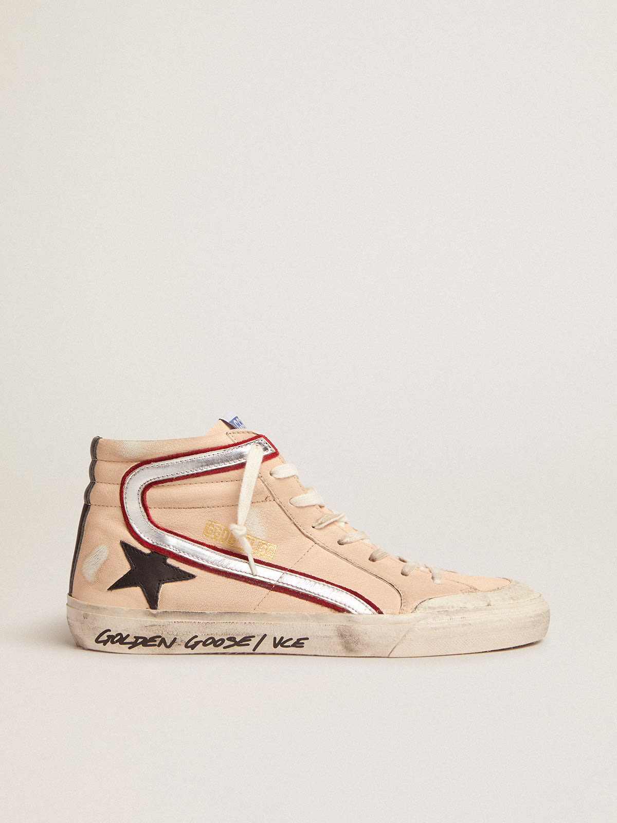 Sneaker Slide Penstar in nappa color salmone chiaro con stella in pelle nera e virgola in pelle laminata color argento