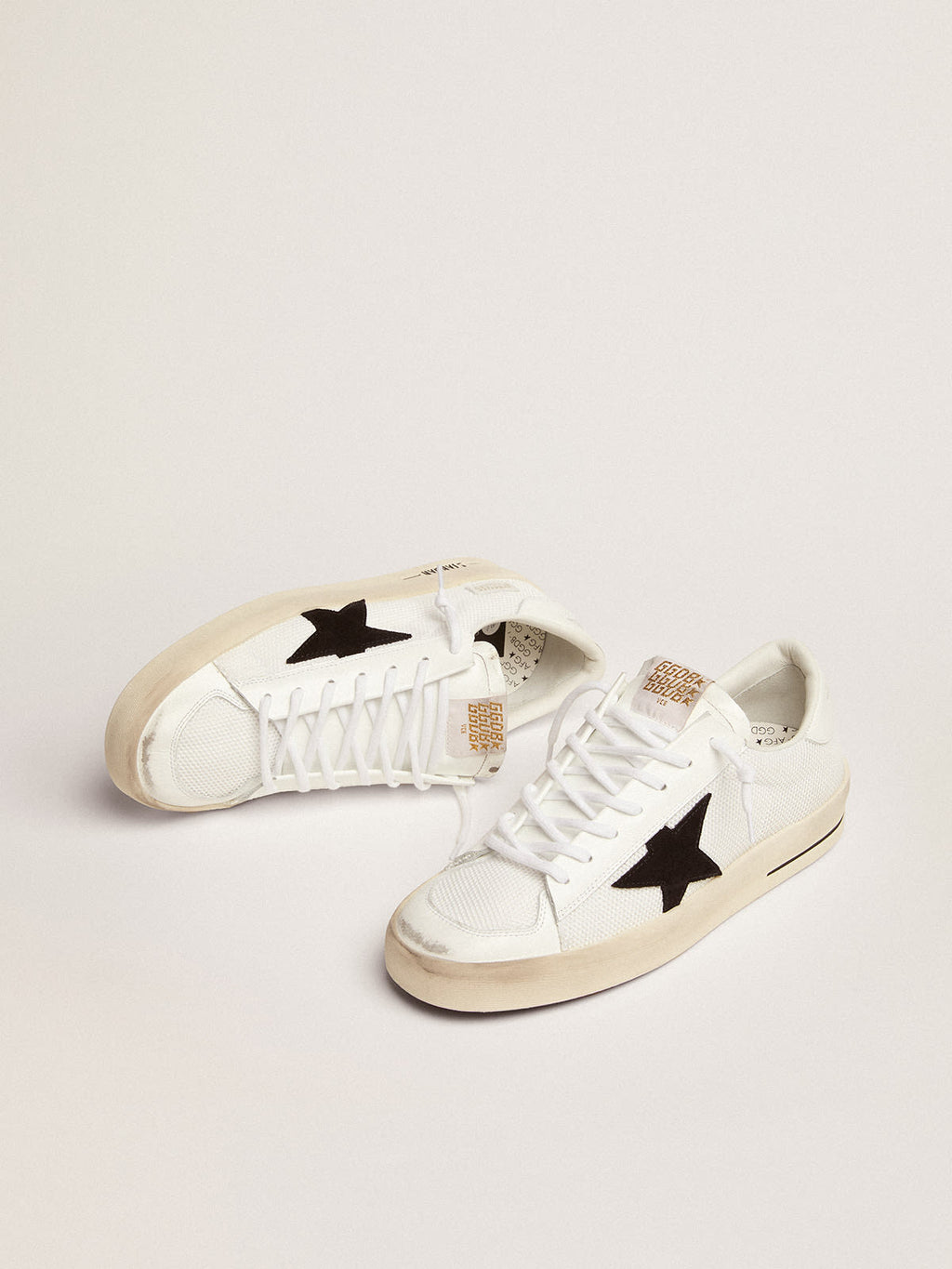 Sneaker Stardan in rete bianca con stella in suede nero e talloncino in pelle bianca