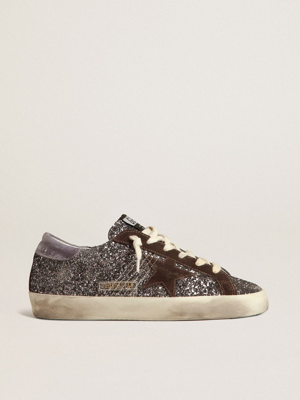 Super-Star in glitter con stella marrone e talloncino lilla