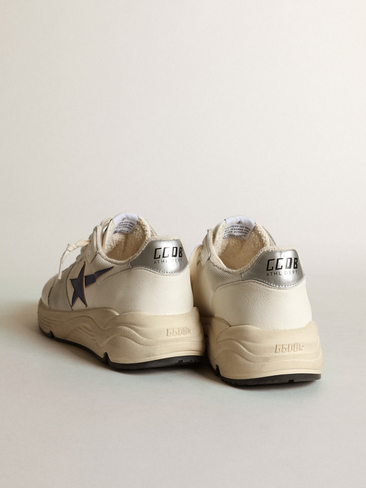 Running Sole in rete e nappa bianche con stella blu