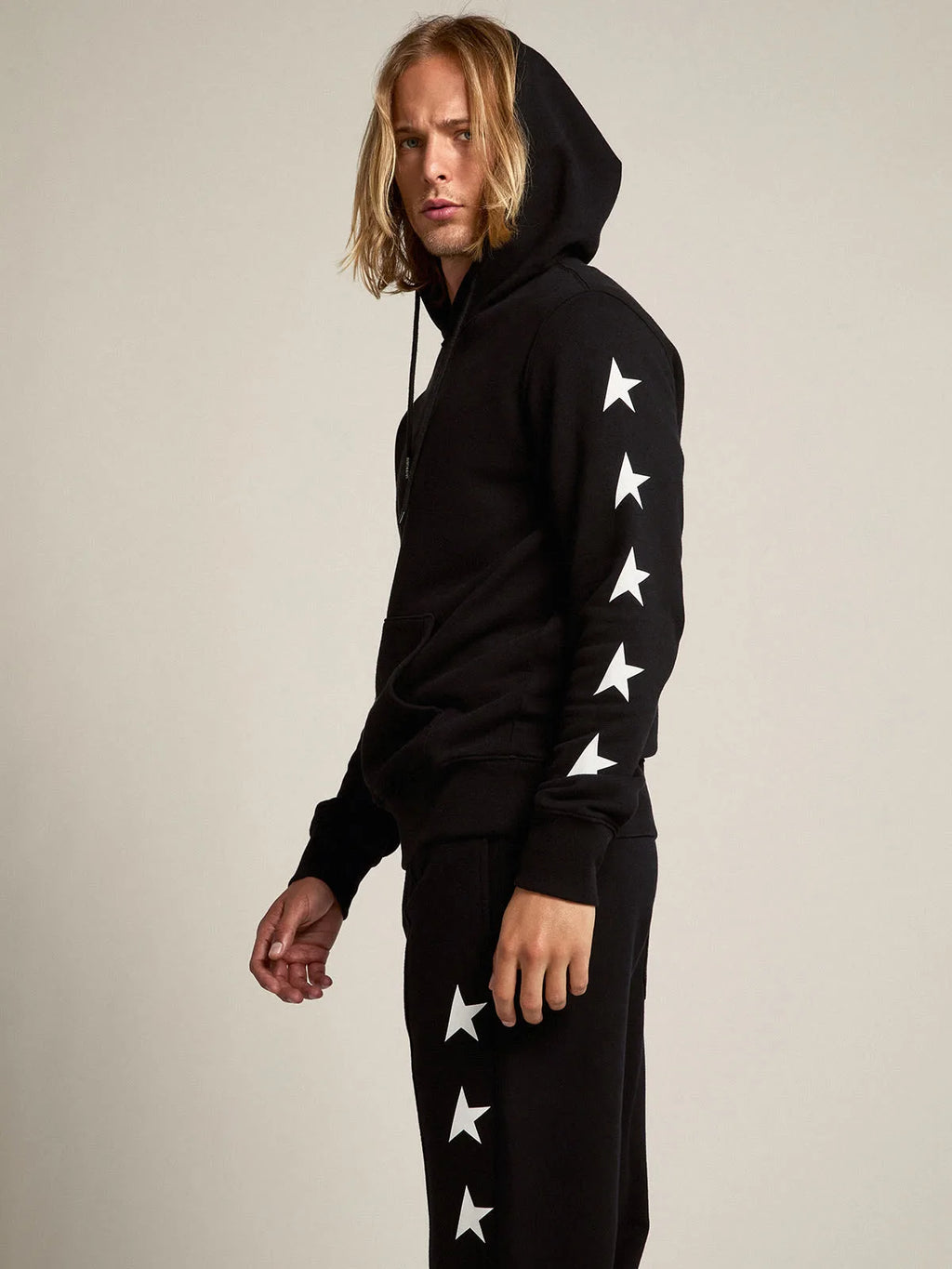 Felpa con cappuccio Alighiero Collezione Star di colore nero con stelle bianche a contrasto