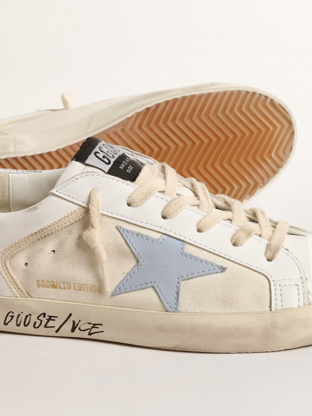 Super-Star LTD con stella azzurra e talloncino in pelle argento