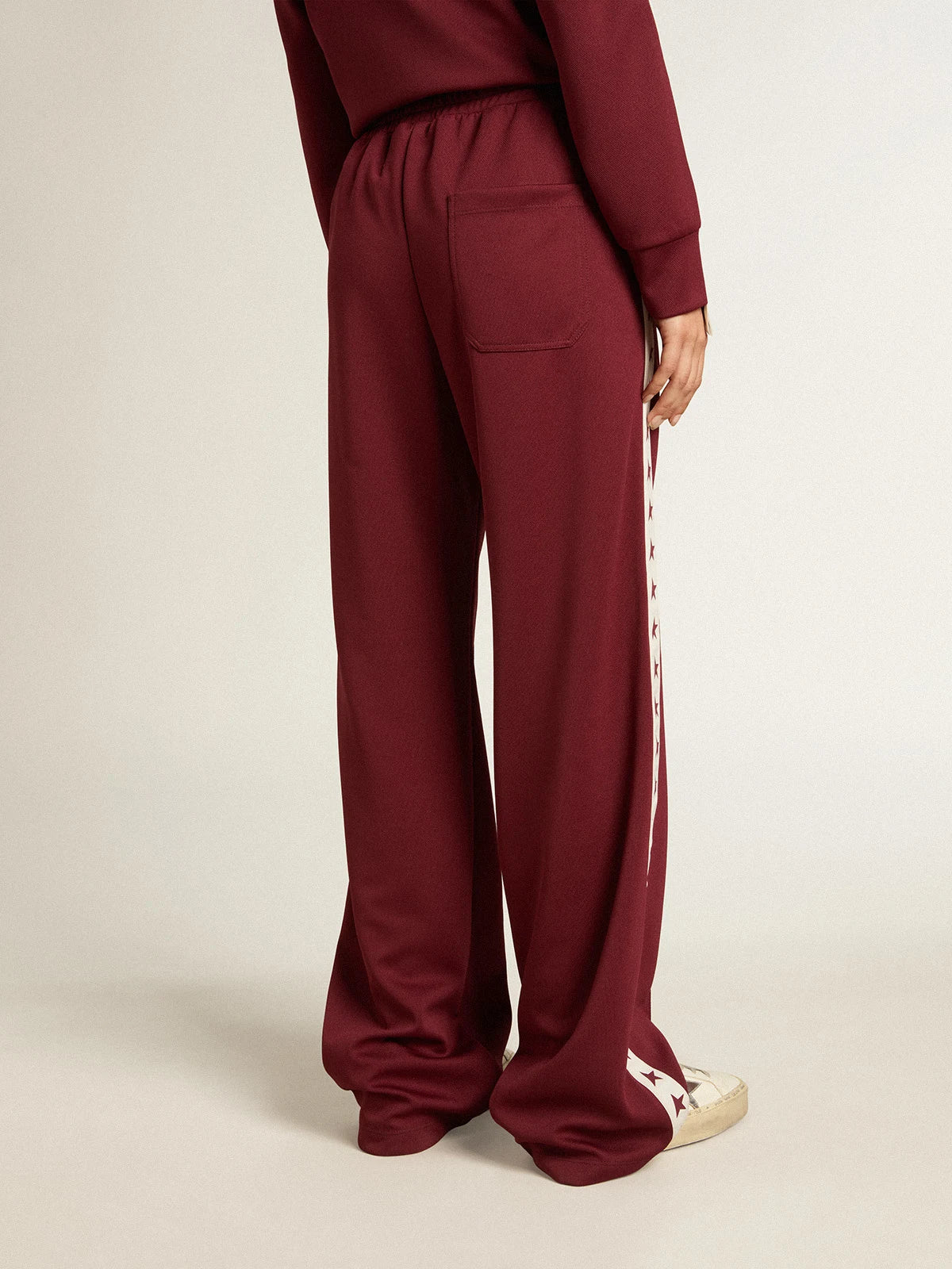 Pantalone jogging da donna di colore bordeaux con stelle sui lati