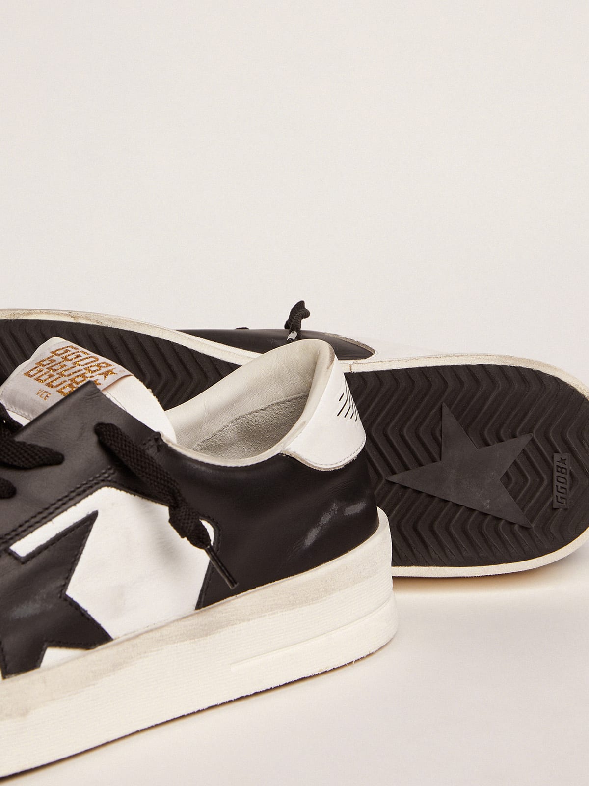 Sneaker Stardan uomo in pelle bianca e nera
