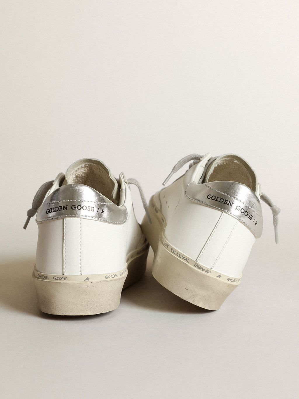 Sneaker Hi Star con stella in cavallino leopardato e talloncino in pelle laminata color argento