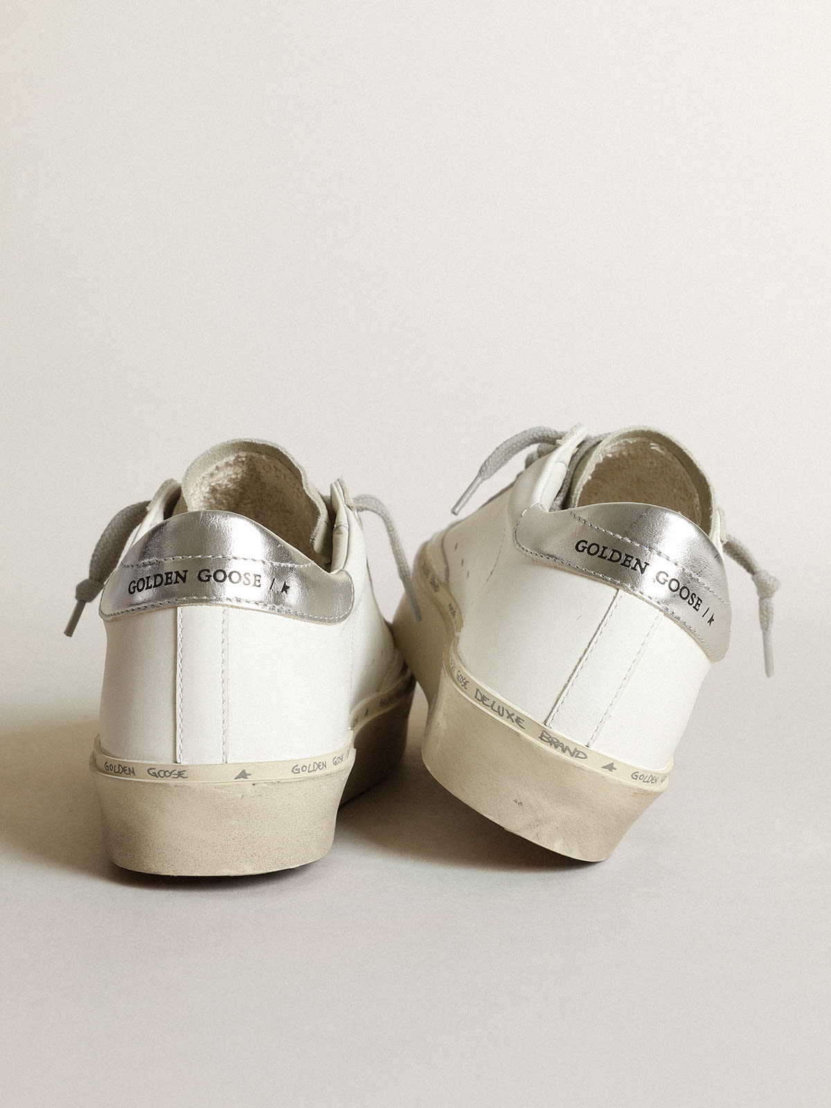 Sneaker Hi Star con stella in cavallino leopardato e talloncino in pelle laminata color argento