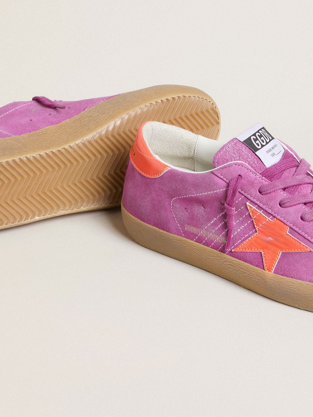 Women's Super-Star in fuchsia suede with fluorescent orange laminated leather star and heel tab