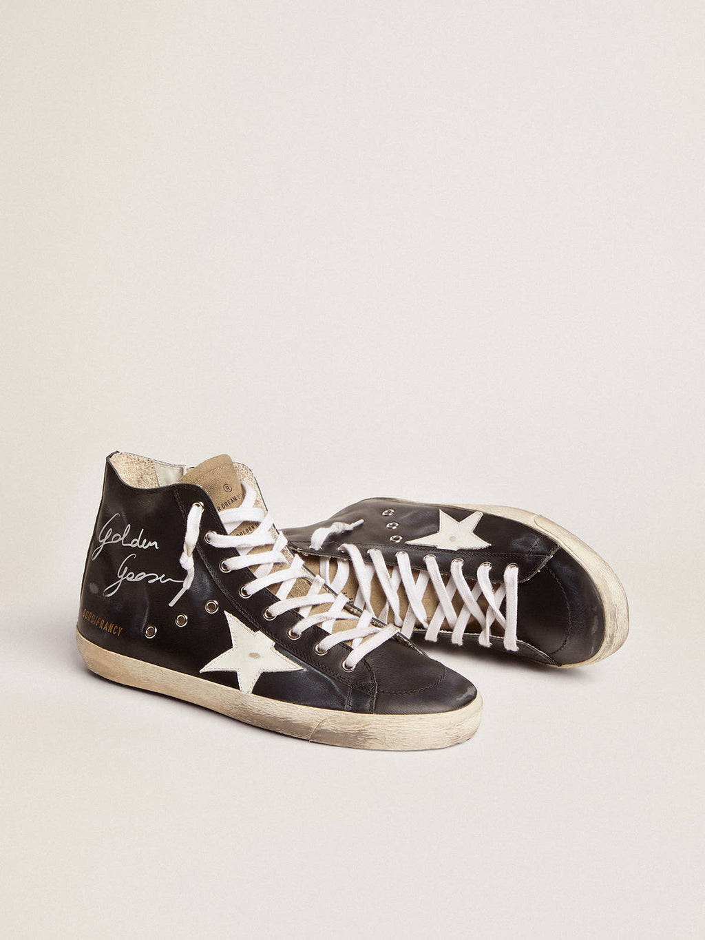 Sneaker Francy con tomaia in pelle nera e stella in pelle bianca