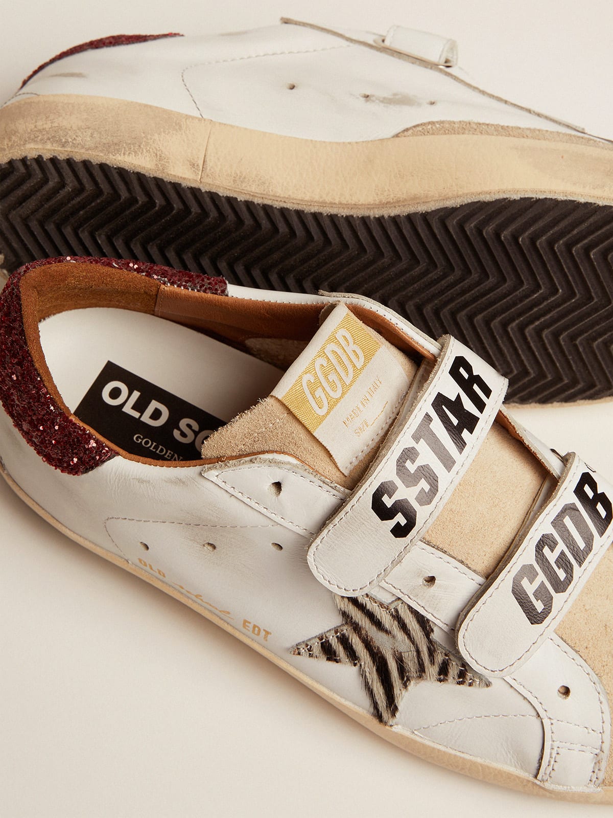 Sneaker Old School con stella in cavallino zebrato e talloncino in glitter rossi
