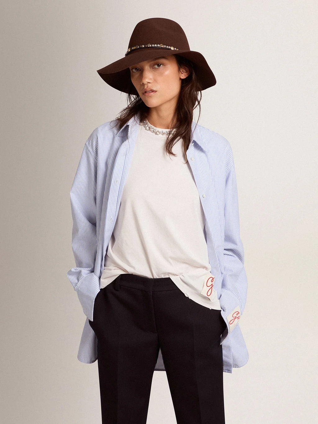 Camicia da donna con righe a bastoncino di colore azzurro