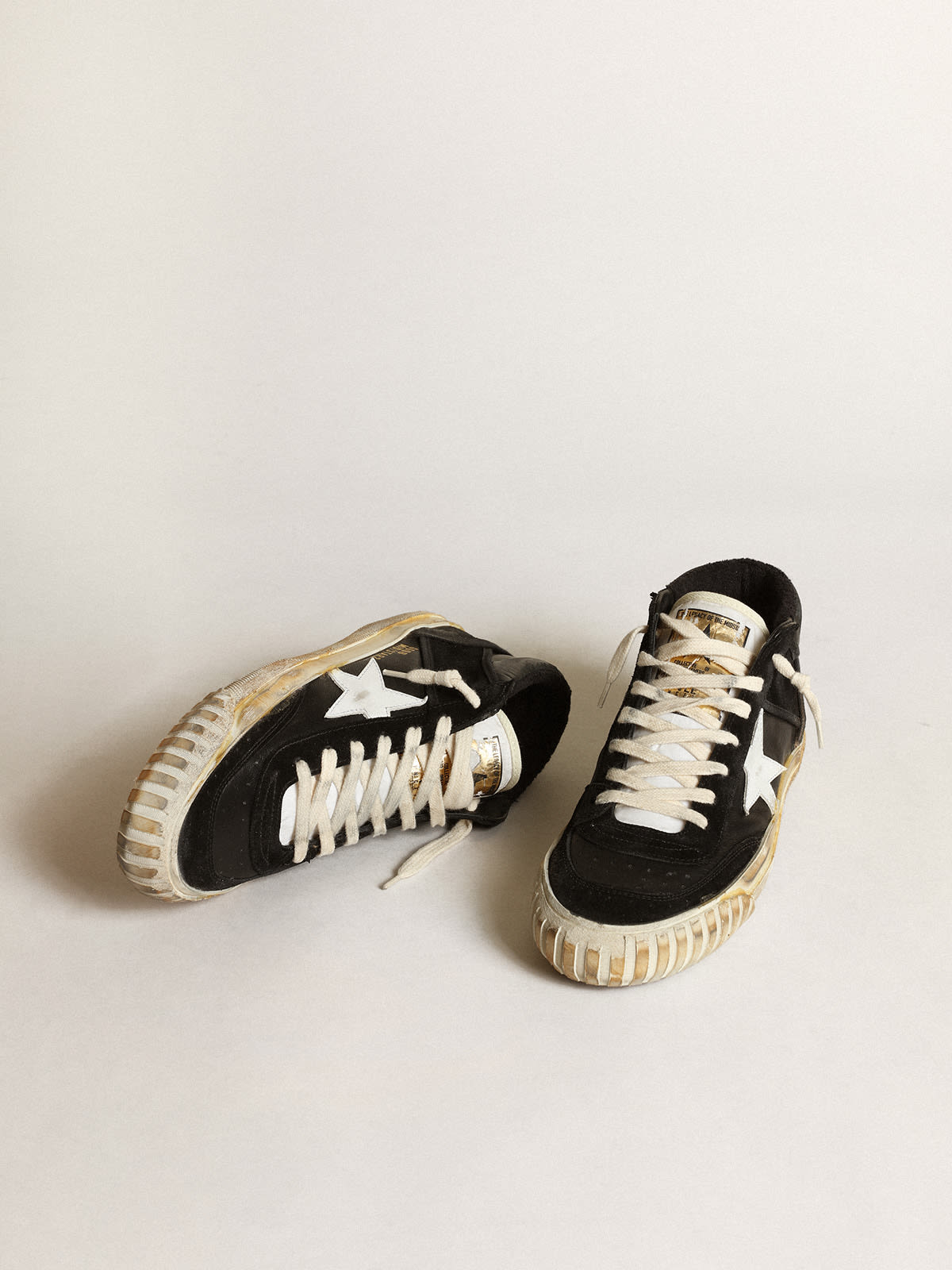 Mid Star Donna in nappa e suede neri con stella in pelle bianca