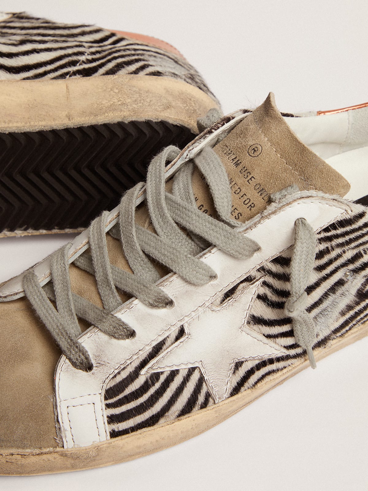 Sneaker Super-Star LTD in cavallino zebrato con stella in pelle bianca e talloncino in pelle laminata color arancione
