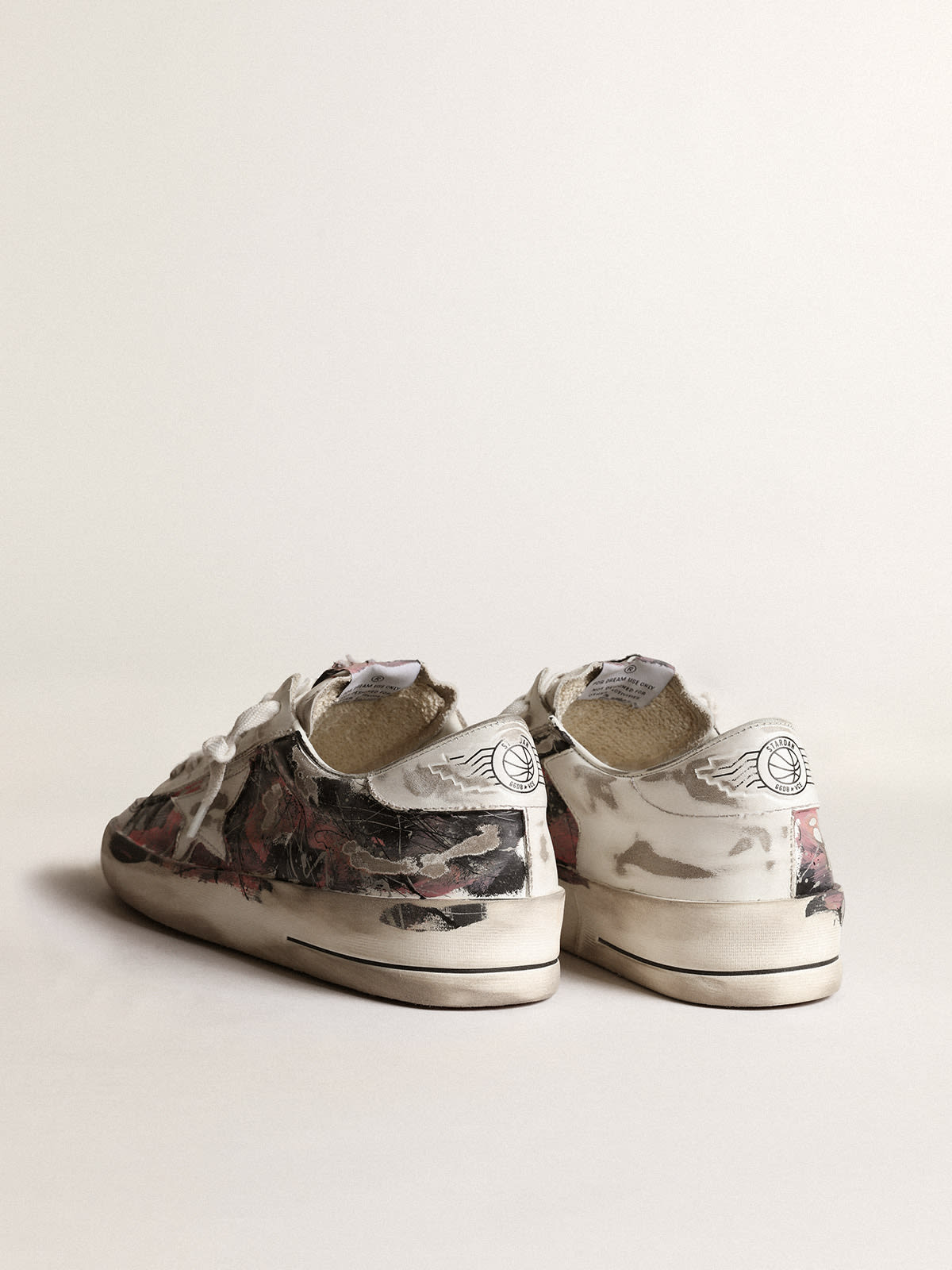 Stardan LAB uomo in pelle con schizzi di vernice multicolore all-over
