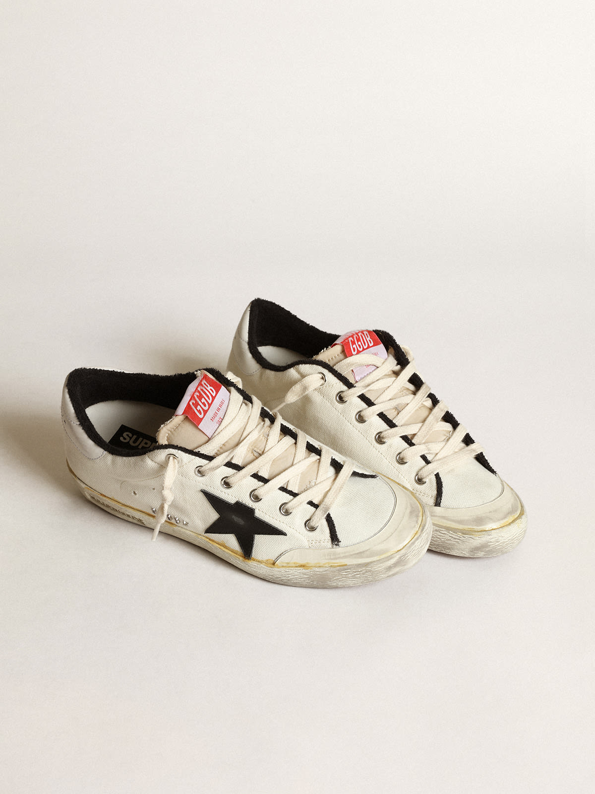 Sneaker Super-Star uomo LTD in canvas beige con stella in pelle nera e talloncino in pelle bianca