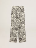 Pantalone jogging di colore bianco con stampa toile de jouy nera