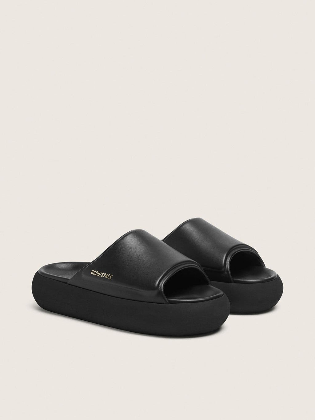 Men's Space-Star Slide slip-ons in black leather