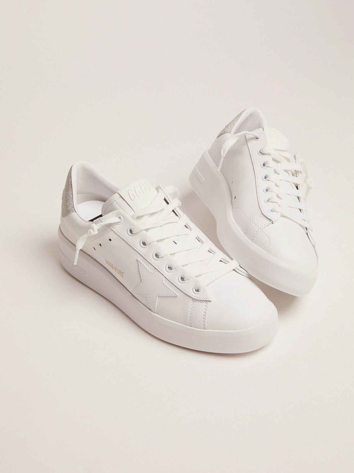 Sneaker Purestar in pelle bianca e talloncino con glitter champagne