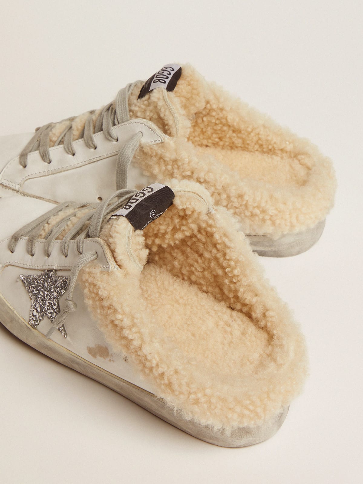 Super-Star Sabot in pelle bianca con stella in glitter argento e fodera in shearling