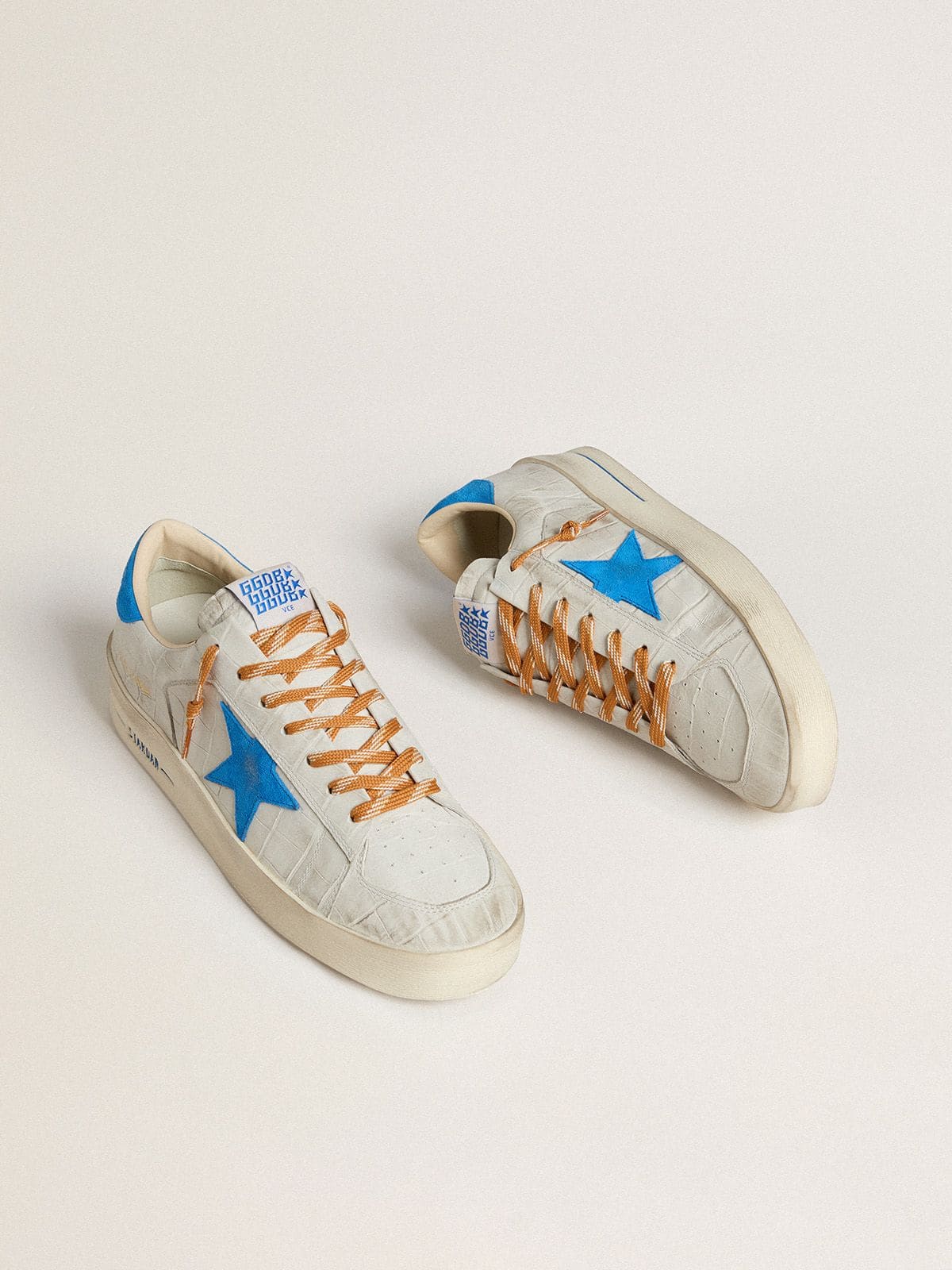 Stardan in white croc-print leather with light blue suede star and heel tab