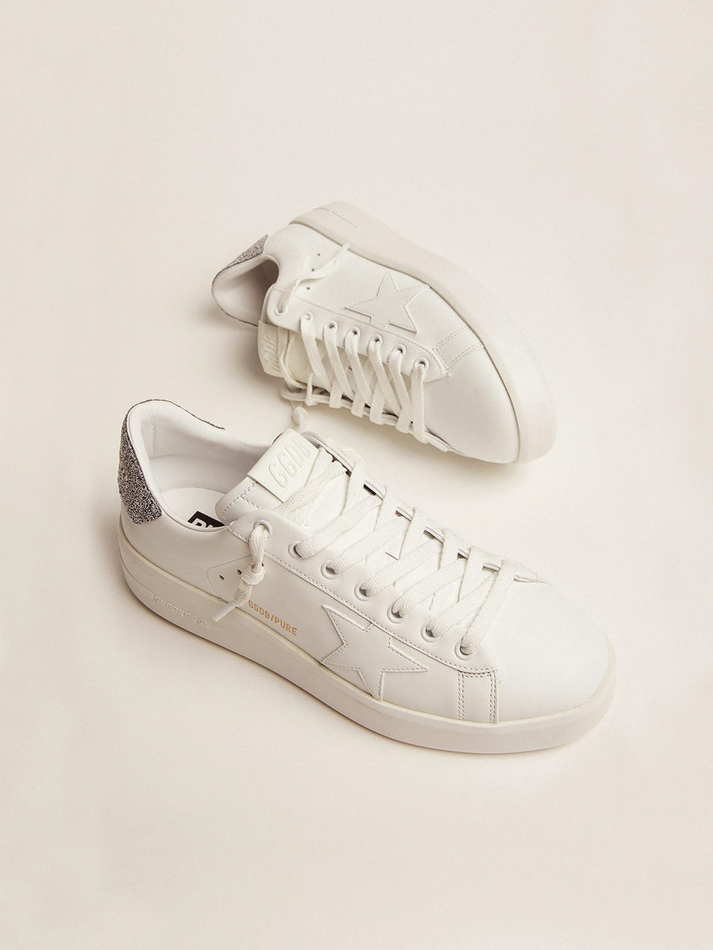 Sneaker Purestar in pelle bianca con talloncino in cristalli Swarovski argento