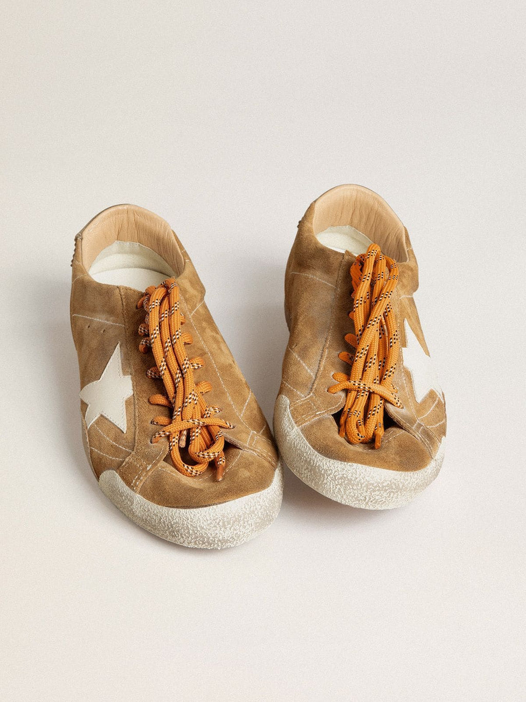 Men's True-Star in tobacco-colored suede with white star and platinum heel tab