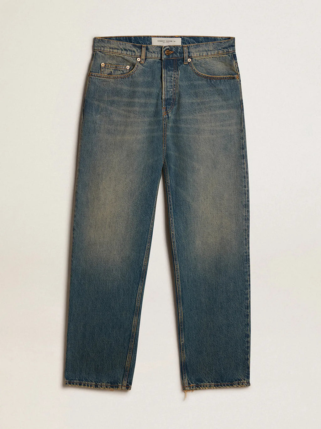 Jeans blu dal trattamento lived-in